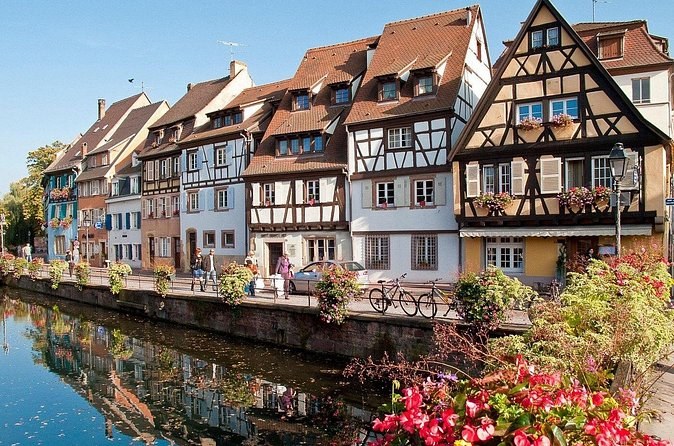 Half-timbered houses along a canal in Alsace